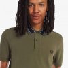 Poloshirts mit Medaillenstreifen