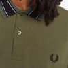 Poloshirts mit Medaillenstreifen