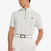 Poloshirts mit Reißverschluss am Kragen und Raglanärmeln