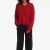 Strickpullover mit Zopfmuster und geteiltem Saum